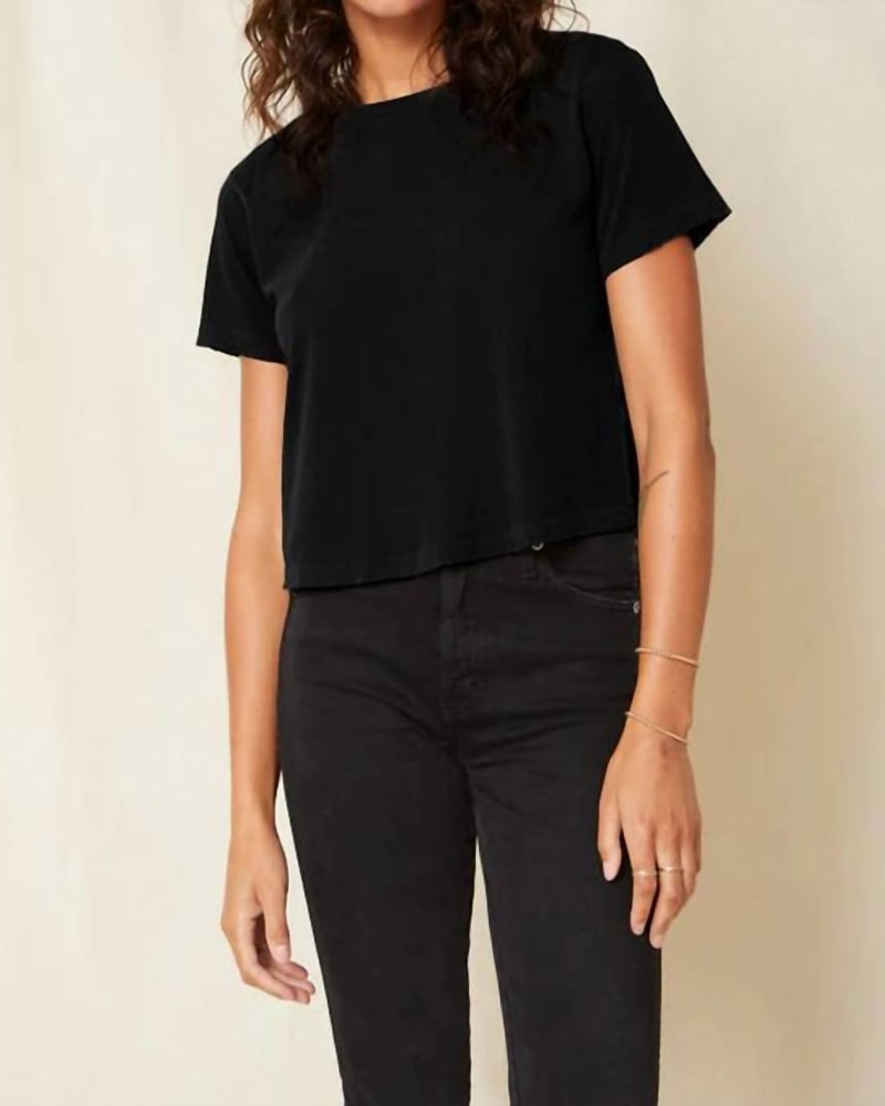 Front of a model wearing a size L Babe Tee in Black in Black by AMO. | dia_product_style_image_id:332596